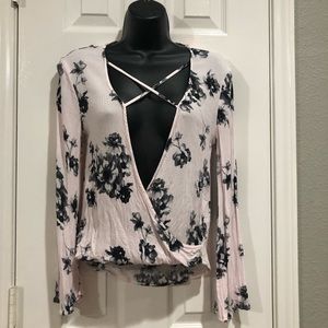 Kirious 100% Rayon pull-over blouse.